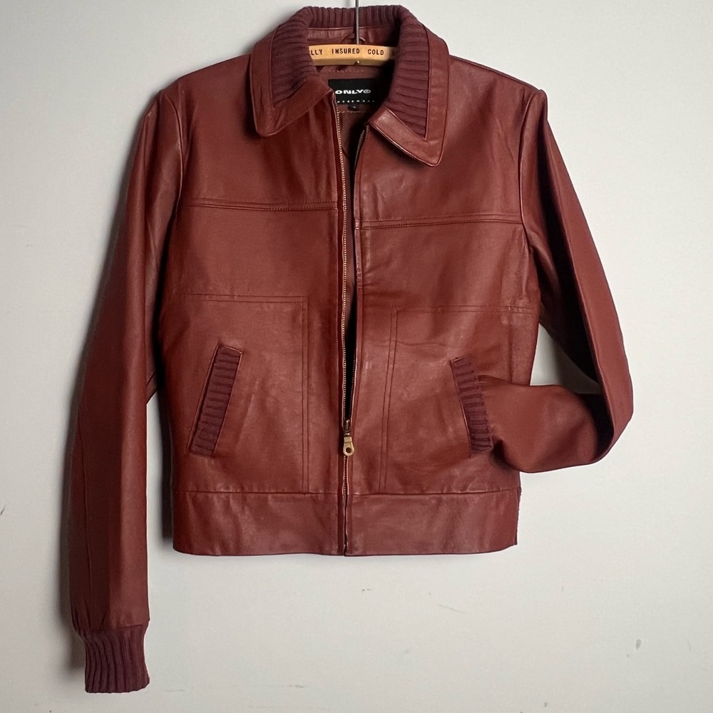 Y2K Women's Leather Bomber Jacket, rust coloured.